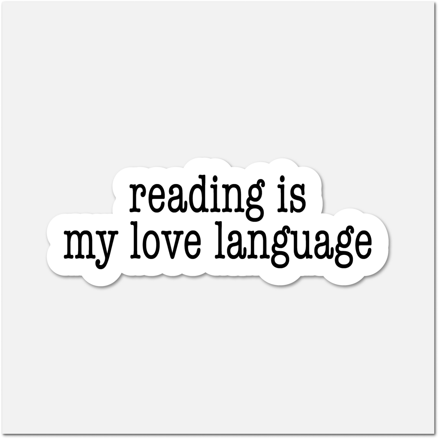 Sticker with 'reading is my love language' text on a white background