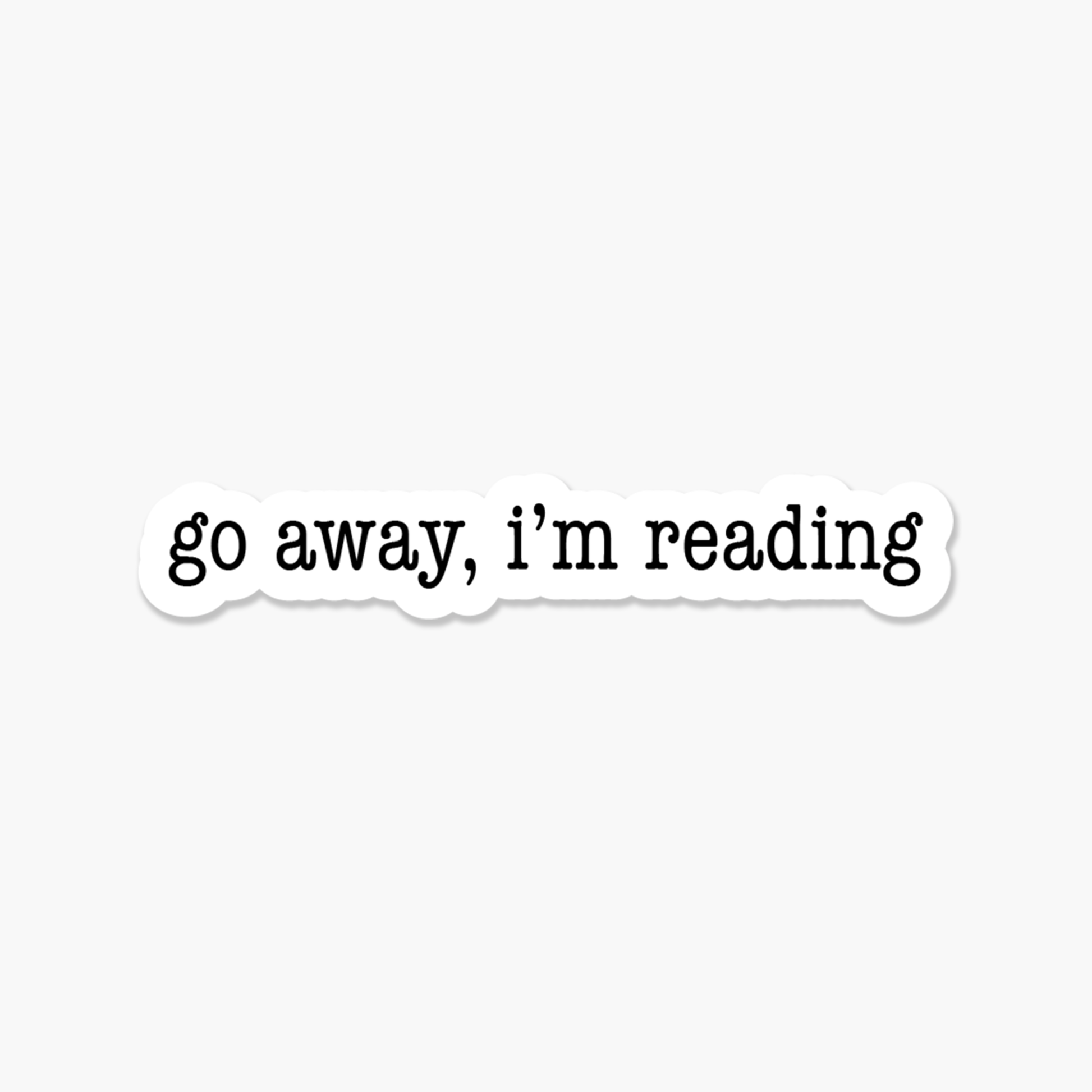 Text 'go away, i'm reading' on a white background