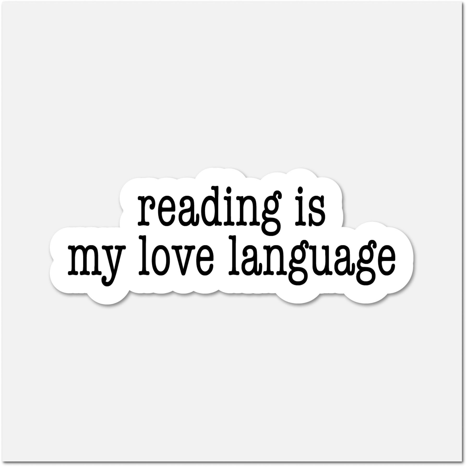 Sticker with 'reading is my love language' text on a white background